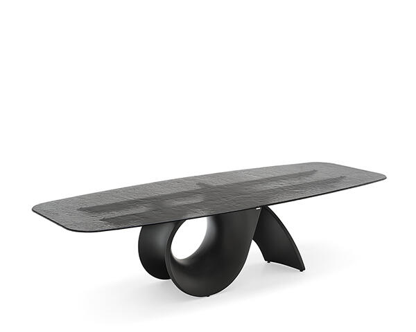 Seashell: Dining table with elliptical top and concrete